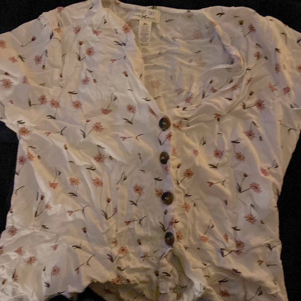 White shirt with pink flowers